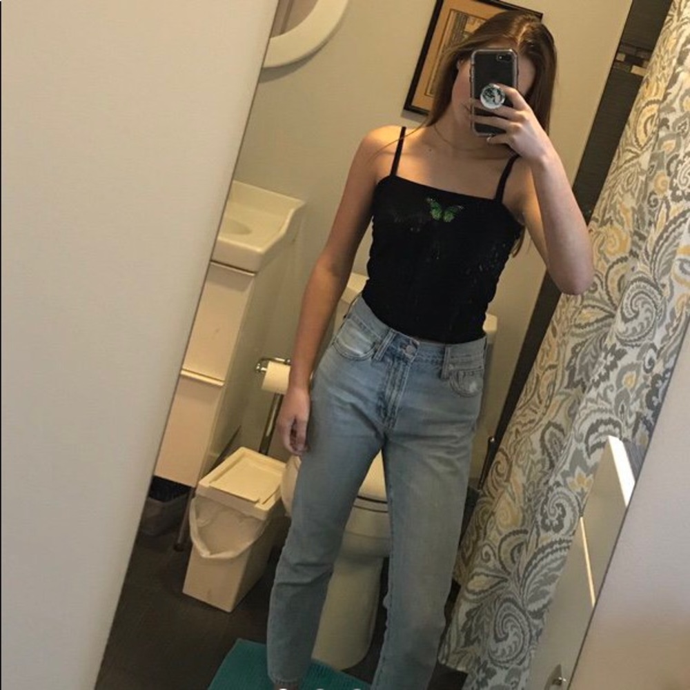 Green butterfly on black tank top!